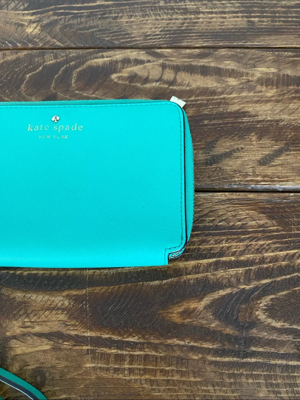 kate spade teal zip-around wristlet with strap